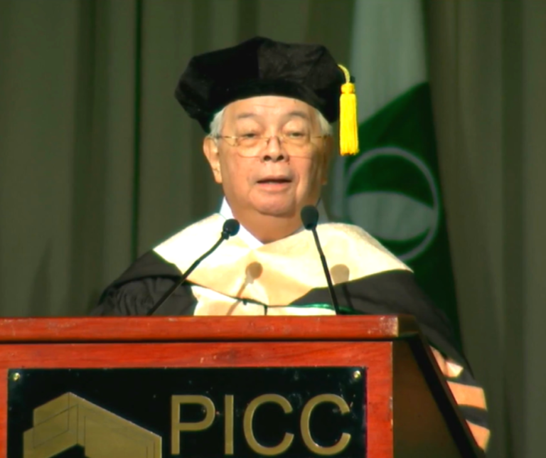 PHINMA Chairman and CEO Ramon R. del Rosario Jr. speaks after receiving an honorary degree of Doctor of Business Administration from De La Salle University